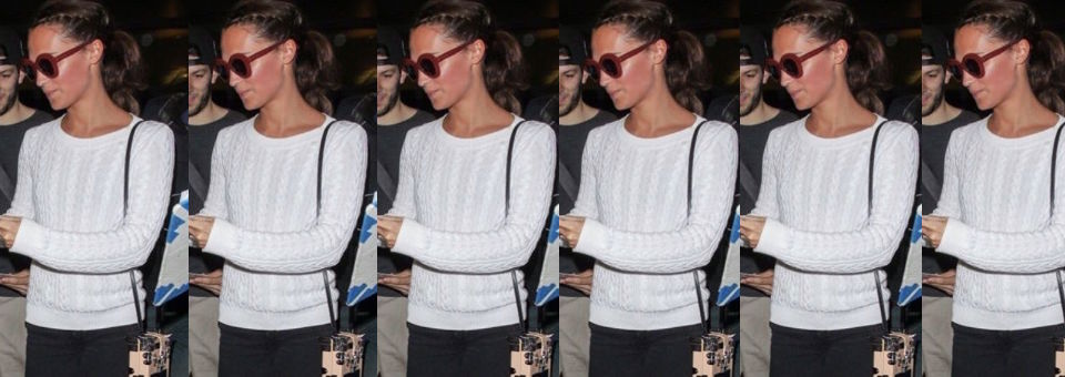 Alicia Vikander is stylish in sweater and skinny jeans