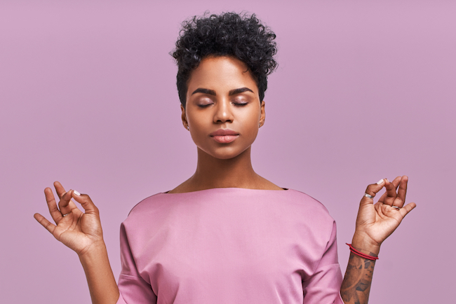 woman in purple, in a calming moment